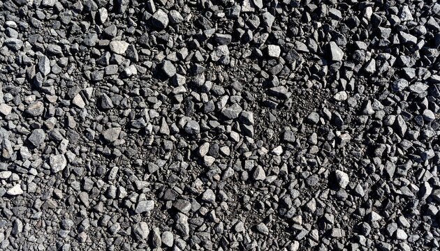 Close-up texture of dark crushed stone aggregate