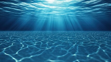 Underwater scene, sunlight beams through deep blue water