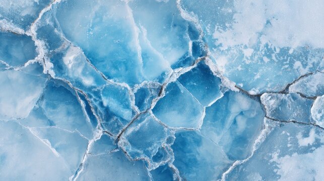 Close-up of fractured ice, with blue and white hues, showcasing natural patterns