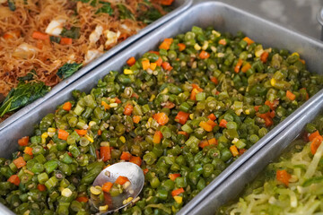 Traditional Rames, captured on October 2, 2025. Mixed rice with a variety of side dishes including vegetables, proteins, and sauces, colorful and flavorful presentation, authentic Indonesian cuisine v