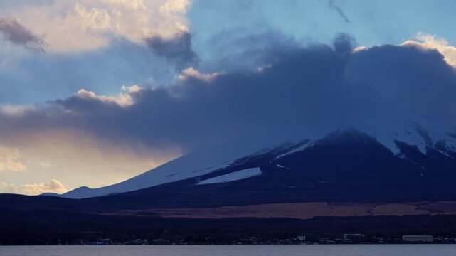 Cinematic timelapse of clouds rolling over Mount Fuji during winter