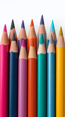 Set of colorful sharpened pencils arranged in row on white background.  
