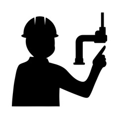 Construction worker pointing at pipe in silhouette