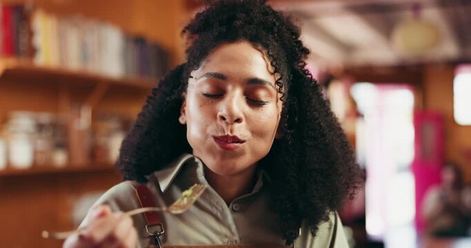 Tasting, meal and woman in kitchen, chef and delicious food for hospitality, culinary skills or dish. Eating, cuisine and quality control of flavor, happy and person with satisfaction in restaurant