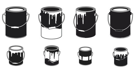 Black and white paint cans with dripping paint arranged in a row