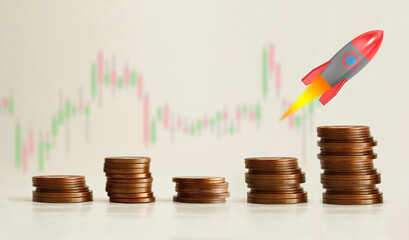 Increase your earnings and boost your income. Rocket flying above the stacks of coins as the symbol of income growth