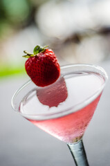 Elegant Strawberry Martini Cocktail with a Fresh Strawberry Garnish