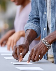 Focused african male adults selecting cards at table