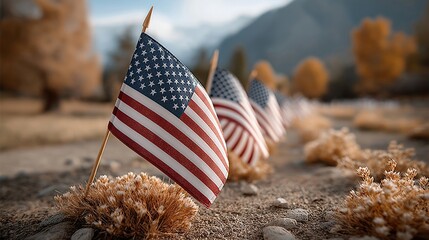 American flags in autumn landscape with mountains in the background