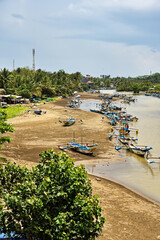 Coastal scene and local boats on the island of Java