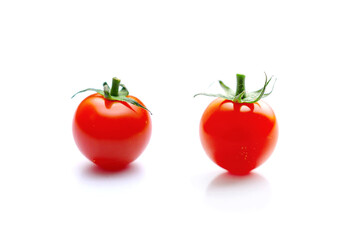 Cherry tomatoes isolated on white background.