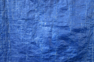Blue Wrinkled Fabric Texture. Detailed wrinkled blue fabric surface, perfect for fashion design,...