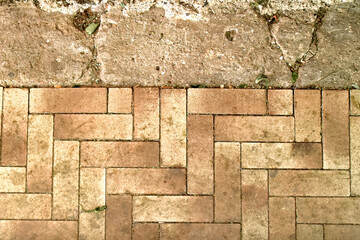 Old Brick Pavement Texture. High-resolution photo of old brick pavement with vintage herringbone...