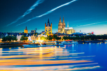 Great St. Martin Church And Dom In Cologne At Evening With Reflection In River Rhine, Germany