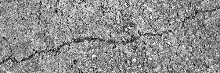 Cracked asphalt horizontal texture. Horizontal cracked asphalt road surface, grunge construction texture background.