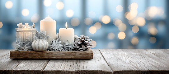 Festive winter candles and decorations on a rustic wooden surface