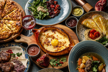 Traditional Georgian feast with khachapuri and wine