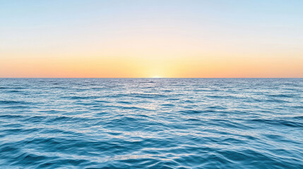 Fototapeta premium Vast ocean horizon with colorful sunset sky creates peaceful atmosphere
