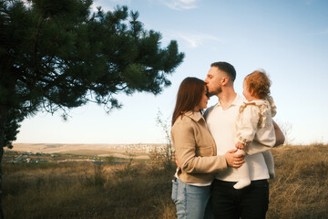 A Heartwarming and Intimate Family Moment Happening in the Beautiful Nature Around Us