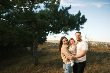 A cherished family portrait that beautifully captures moments in the embrace of nature