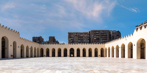 Courtyard of the Mosque of al-Zahir Baybars, Cairo, Egypt. Islamic architecture with arched...