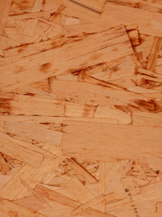 Close up of oriented strand board texture with natural wood pattern background