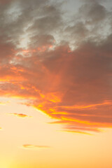 Obraz premium Dramatic Sunset Sky with Orange Clouds