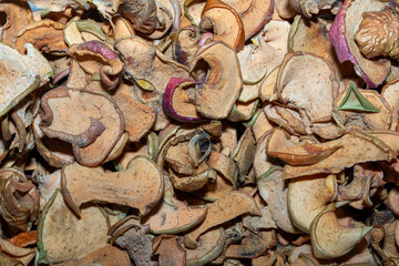 Sliced dried apples texture. Dried apples background flat lay. Dried fruits. Apple chips. Healthy good concept