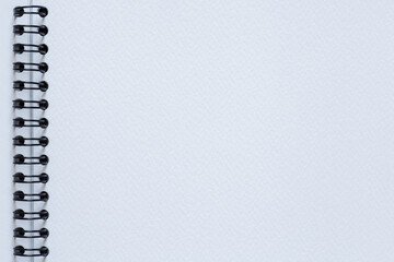 blank white page of watercolor sketchbook with spiral binder