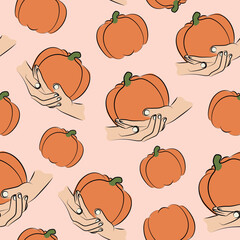 seamless pattern of human hands holding an orange ripe pumpkin in line art style with colored spots behind on a pink background