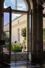 view from balcony on alley in hanging gardens of the small hermitage, greenhouse of bushes and roses, Winter Palace, Saint Petersburg, Russia, 23rd of July, 2025