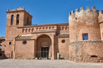 Naklejka premium The imposing facade of the church and castle in Monteagudo de las Vicarias, a historical treasure of Soria