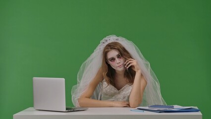 Dead Bride Working on Laptop at Desk