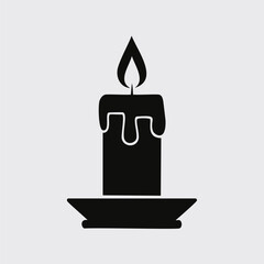 Black silhouette of a melting candle on a saucer dripping