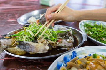 Steamed fish served in Taiwanese stir fry restaurant