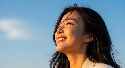 Radiant Joy - A Young Womans Upward Gaze in Golden Light.
