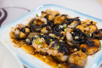 Steamed eel with black bean sauce dish