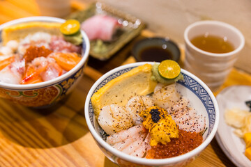Premium Japanese sashimi rice bowl with seafood assortment