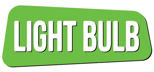 LIGHT BULB text on green trapeze stamp sign.
