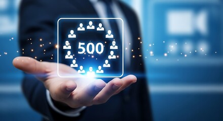 Hand holding a digital display showing 500 followers, symbolizing social media influence and community growth, representing the power of online networking and engagement