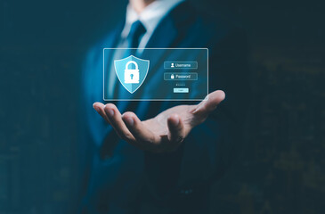 Businessman holding digital security login interface with username and password fields, symbolizing cybersecurity, data protection, online privacy, and secure access in modern technology.