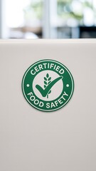 Close-up of a pristine certified food safety emblem on a clean surface