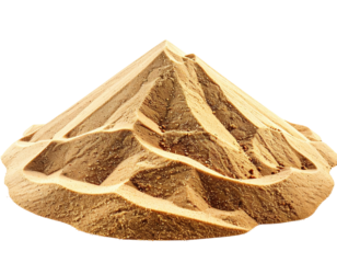 Carved sand sculpture of a mountain range with layered, detailed features