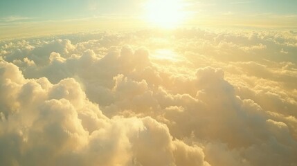 90.A mesmerizing skyscape at dawn, with fluffy white clouds stretching across the frame, illuminated by the warm glow of the rising sun. The deep blue sky transitions into vibrant shades of gold and