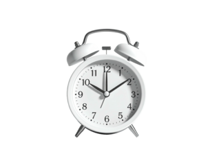 Classic white alarm clock with twin bells stands out against a black background