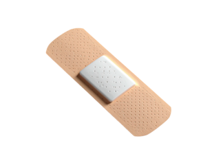A tan adhesive bandage with a white pad, isolated against a black background