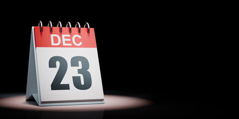December 23 Calendar Spotlighted on Black Background