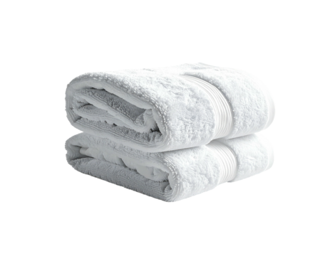 Two fluffy white towels stacked neatly, with striped detail, set against black