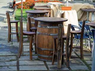 detail of wooden table created with wooden barrel in le grazie a little village near portovenre