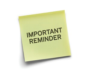 Light yellow square sticky note with black text 'important reminder' standing out